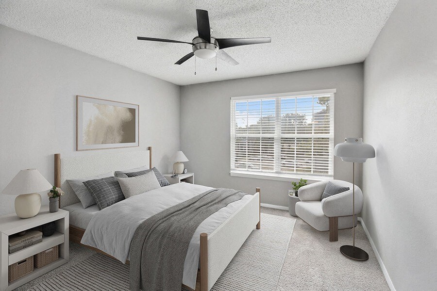 Model Bedroom with Carpet and Window View at Abbington Heights Apartments in Antioch, TN.