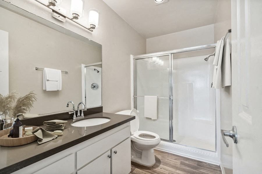 Model bathroom with tub and shower combo