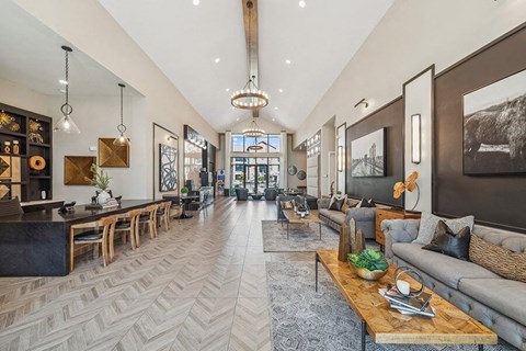 Community Clubhouse and Leasing Office Area at Alta 3Eighty Apartments located in Aubrey, TX.