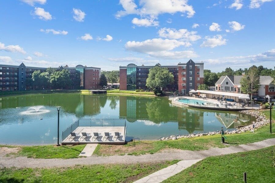 Large pond with dock at Esprit Cherry Creek, Glendale Colorado