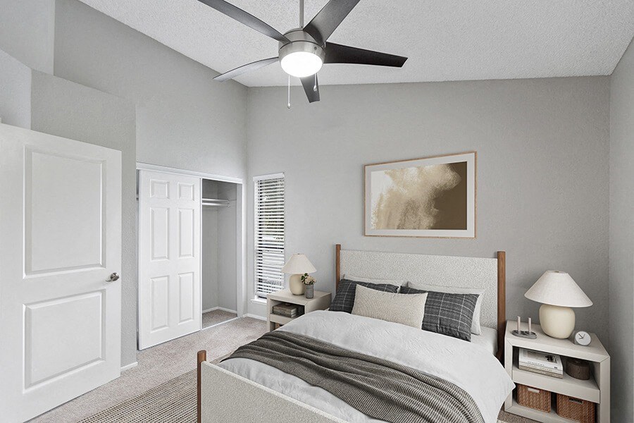 Model Bedroom with Carpet and Closet at The Meritage Apartments in Vallejo, CA.