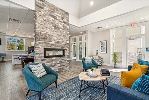 Community lounge space with fireplace