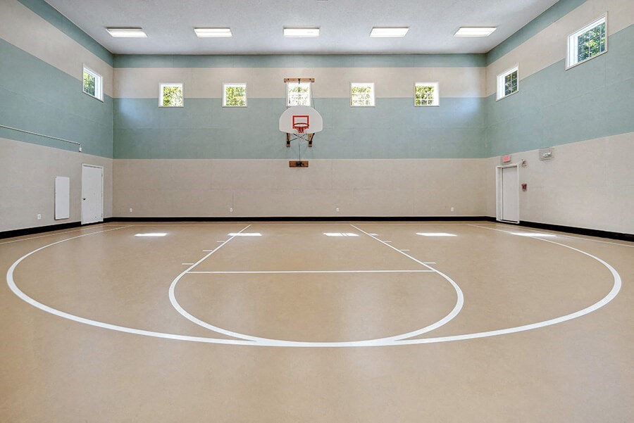 Indoor Basketball Court at The Commons at Haynes Farm Apartments in Boston, MA.