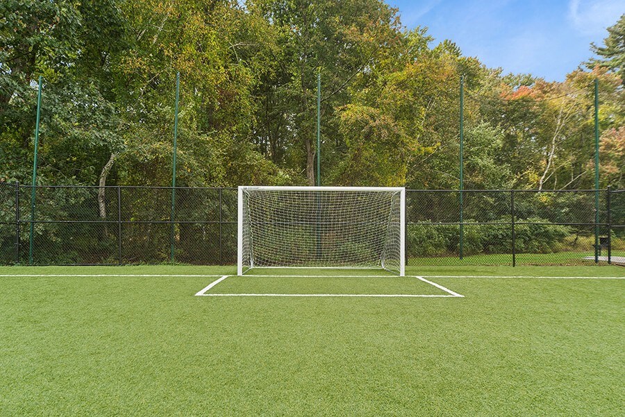 Community Soccer Field with Nets at Meadows at Marlborough Apartments located in Marlborough, MA.