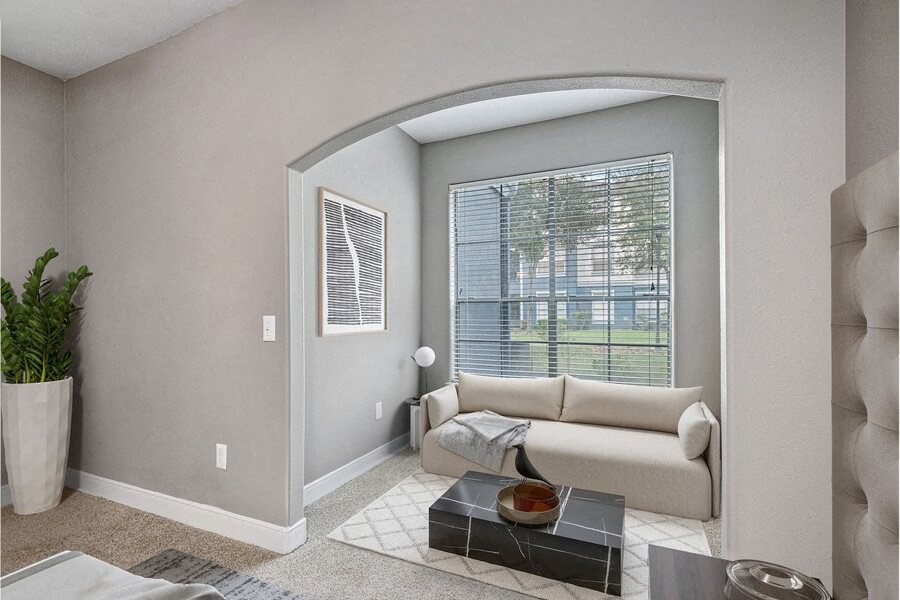 Model living room showcasing large windows