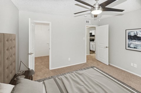 Model primary bedroom at Autumnwood Apartment Homes at Autumnwood, Arlington, TX