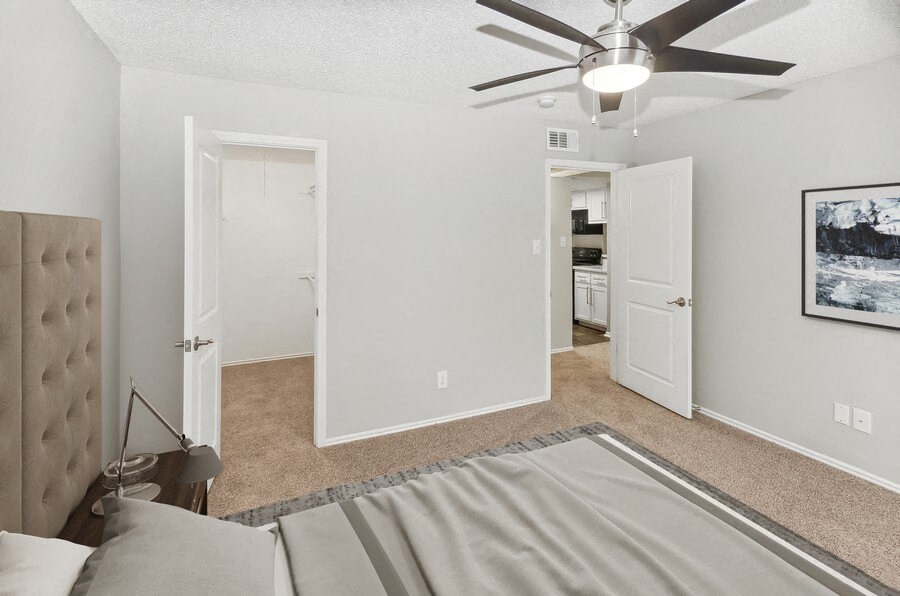 Model primary bedroom at Autumnwood Apartment Homes Model primary bedroom at Autumnwood Apartment Homes at Autumnwood, Arlington, TX