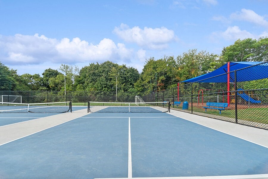 Community Pickleball Courts with Nets at Heights at Marlborough Apartments located in Marlborough, MA.