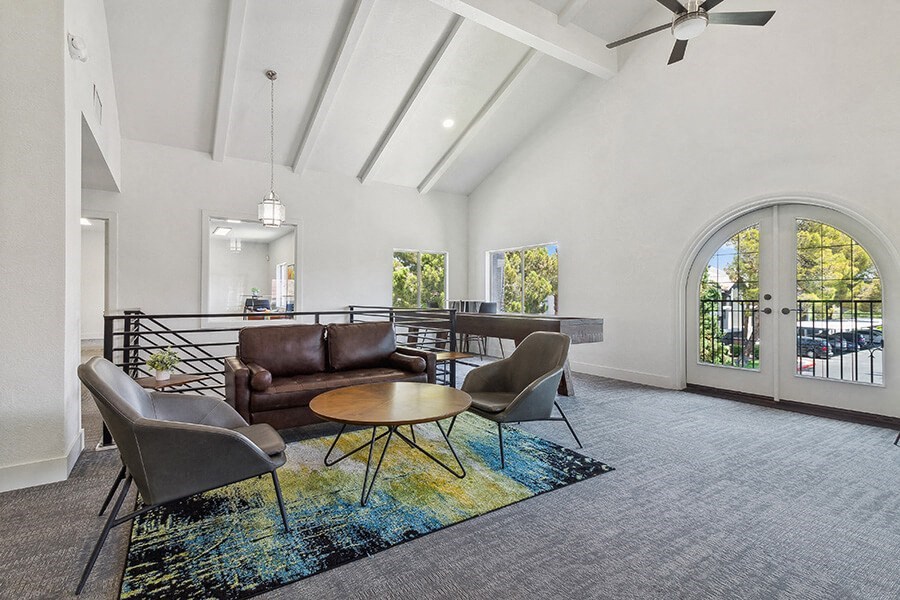 Community Clubhouse with Lounge Furniture at Meadow Ridge Apartments located in Las Vegas, NV.
