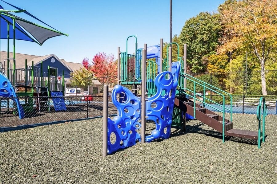 Playground with large sand-filled areas.