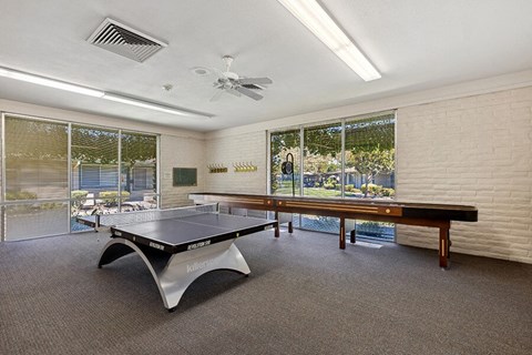Game room with a ping pong table and a pool at Walnut Creek Manor Apartments in Walnut Creek, CA