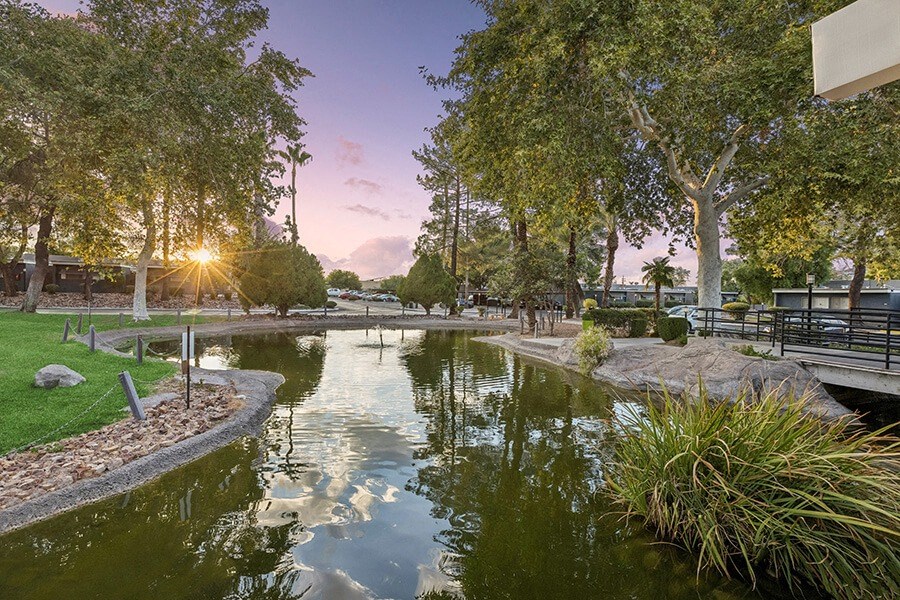 Community Pond and Landscape at Lakeside Casitas Apartments located in Tucson, AZ.