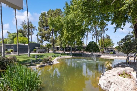 Community Pond with Fountain at Lakeside Casitas Apartments in Tucson, AZ.