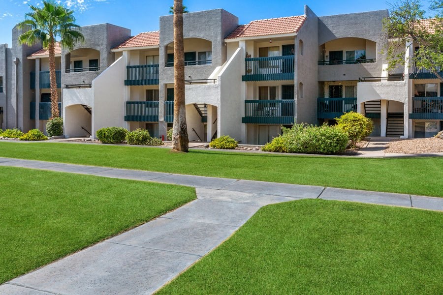 Walking path next to apartment buildings