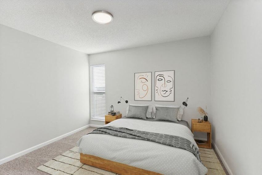 Model bedroom with queen-size bed - Photo Gallery