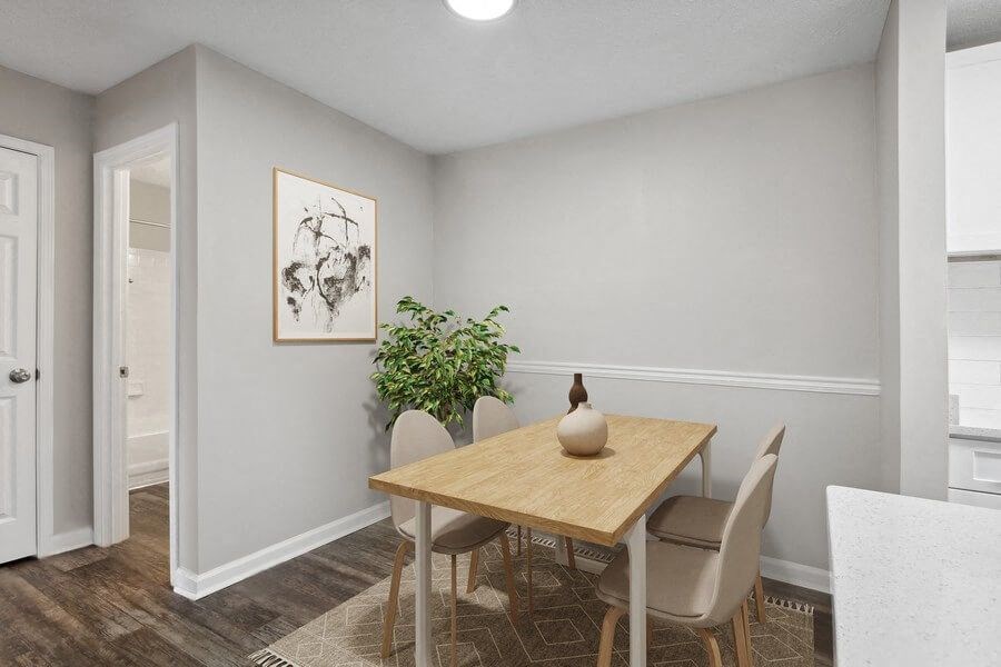 Model Dining Room with Wood-Style Flooring at Element 41 Apartments in Marietta, GA.