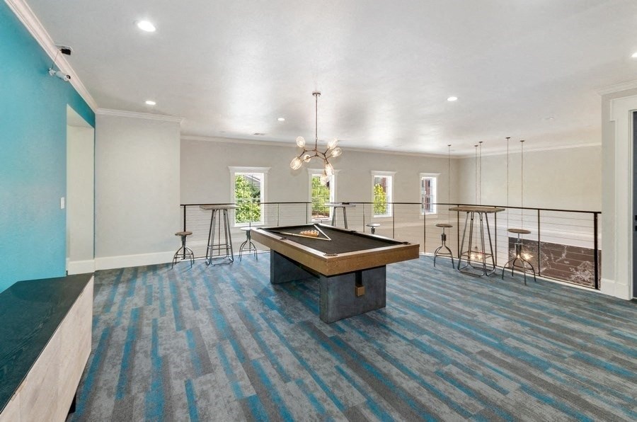 Clubhouse second floor game room with pool table