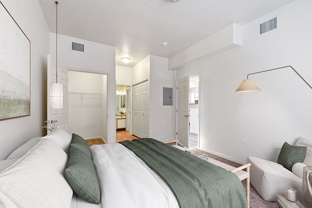 Model Bedroom with Carpet and Hallway View at Altitude on Fifth Apartments in Salt Lake City, UT.