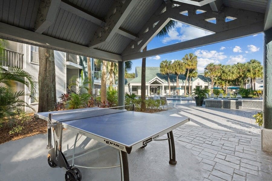 Covered Outdoor Ping Pong Table at Caribbean Breeze Apartments in Tampa, FL.