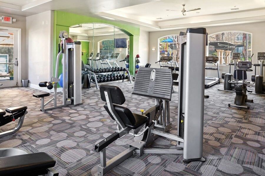 Community fitness center with equipment at Reserve at Rancho Apartments
