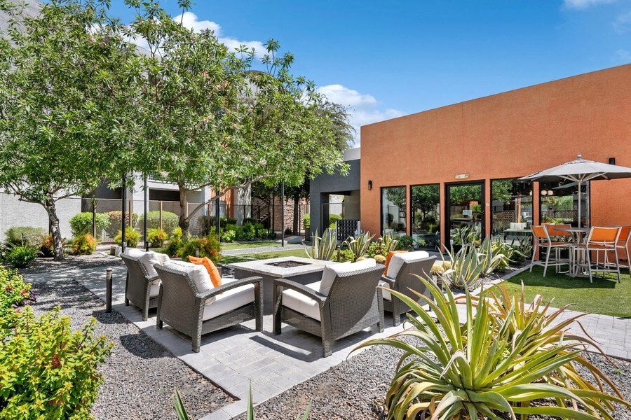 Community Fire Pit Area with Patio Furniture at Harmony Community Fire Pit Area with Patio Furniture at Harmony at Surprise Apartments in Surprise, AZ.