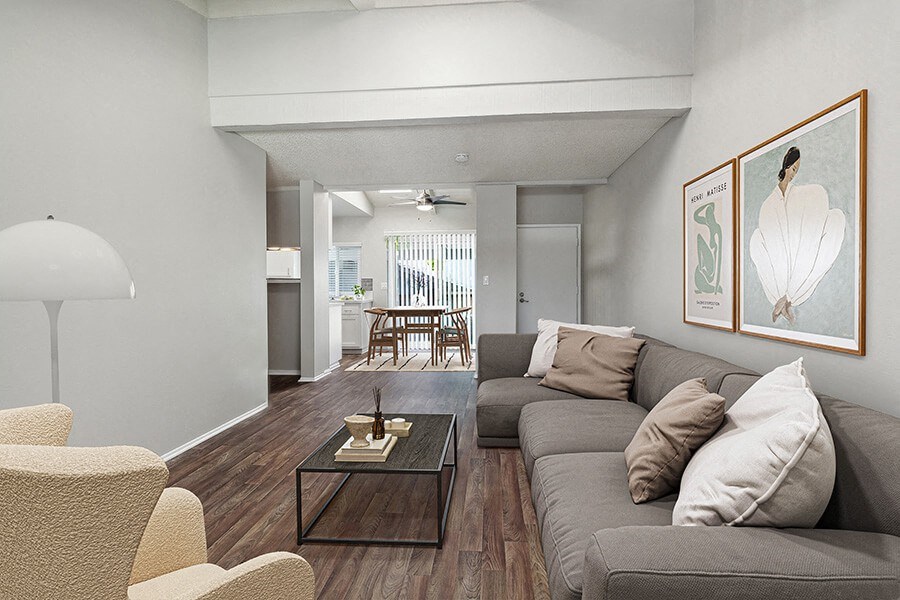 Model Living Room with Wood-Style Flooring at Colonnade at Fletcher Hills Apartments in El Cajon, CA.