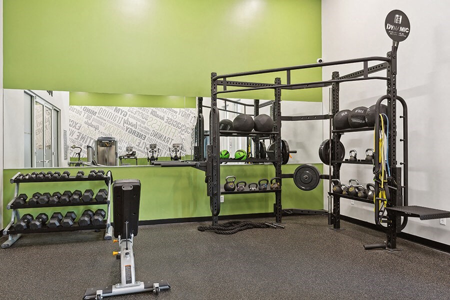 Community Fitness Center with Equipment at Grand Pavilion Apartments in Tampa, FL.