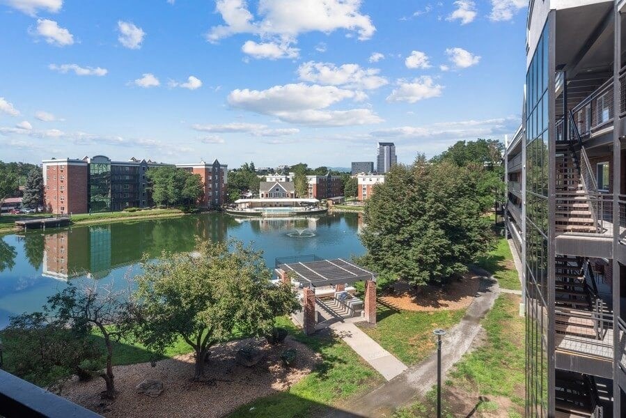 Pond with dock at Esprit Cherry Creek, Glendale, CO