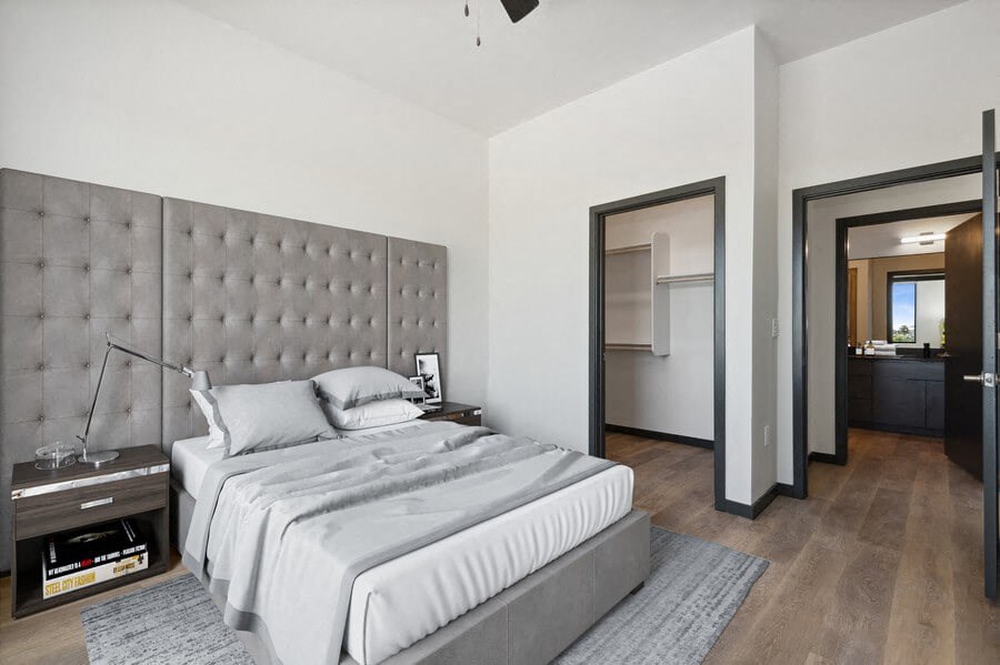 Model bedroom with walk-in closet