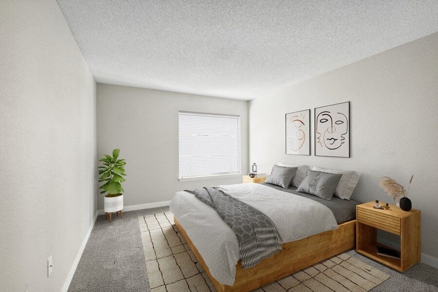 Model bedroom with queen-size bed