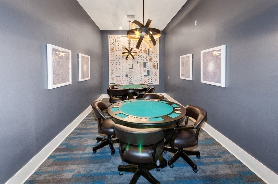 Game room with two casino poker tables for card games