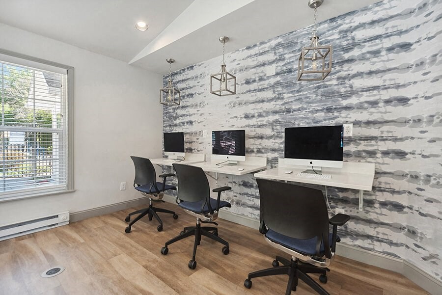 Clubhouse Workstation Area at The Commons at Haynes Farm Apartments in Boston, MA.