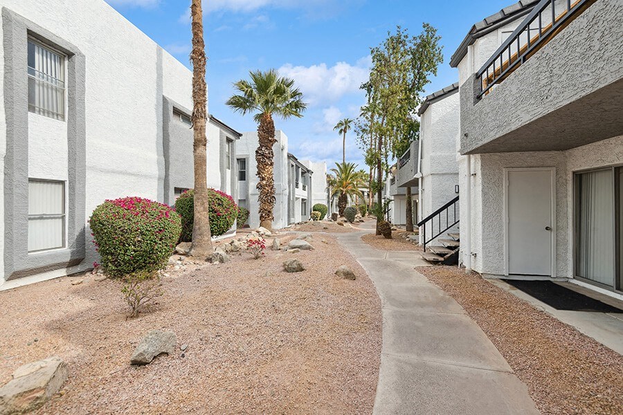 Exterior Community Building and Landscape at Crystal Creek Apartments in Phoenix, AZ.