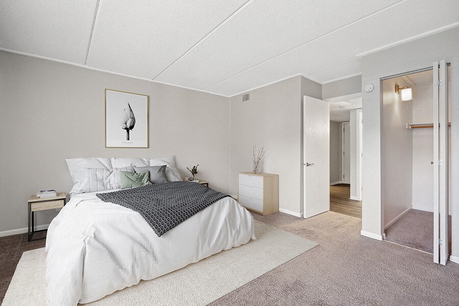 Model Bedroom with Carpet, Closet & Hallway View  at Elevate on Parkway, Burnsville