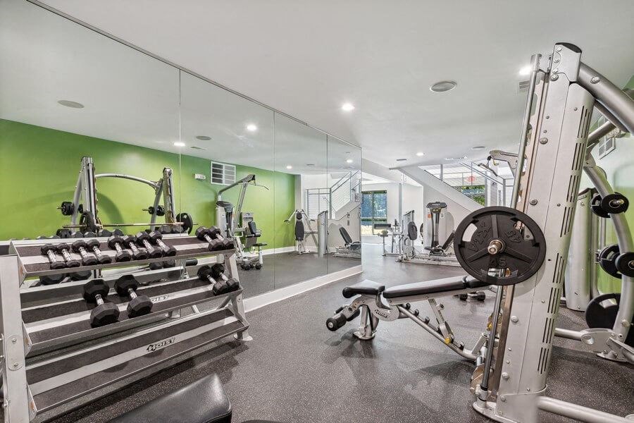 Community Fitness Center with Equipment at Dunwoody Village Apartments in Atlanta, GA.