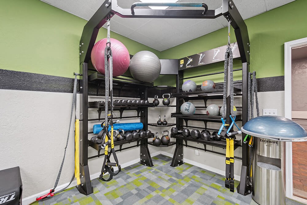 Community Fitness Center with Equipment at Westland Park Apartments in Jacksonville, FL.