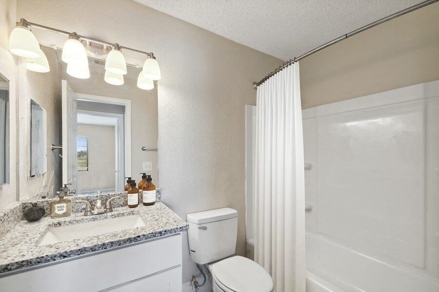 Model bathroom with white vanity