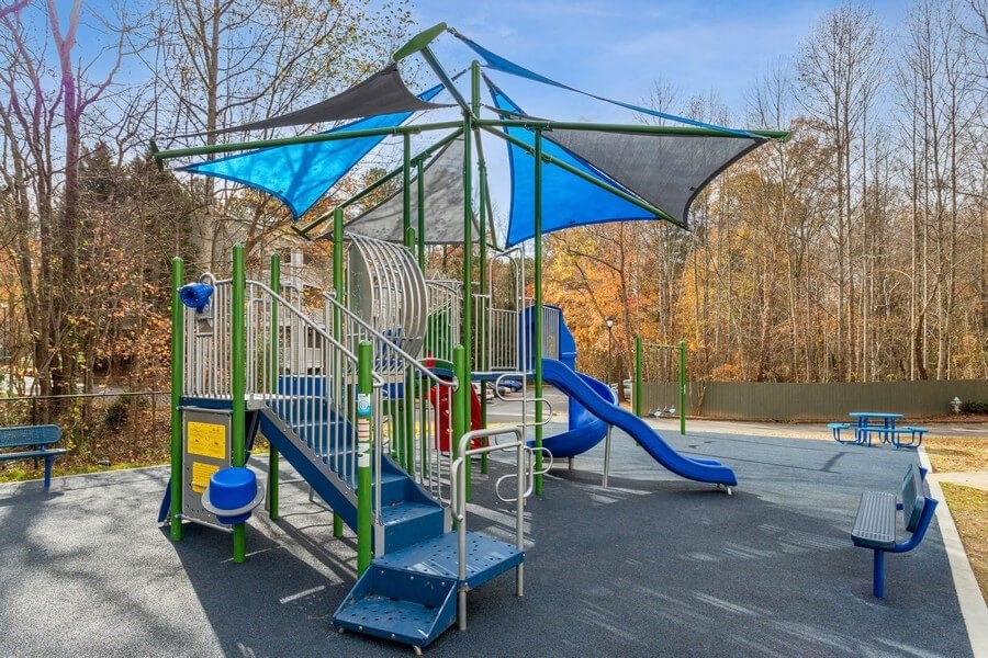 Community playground with padded play surface