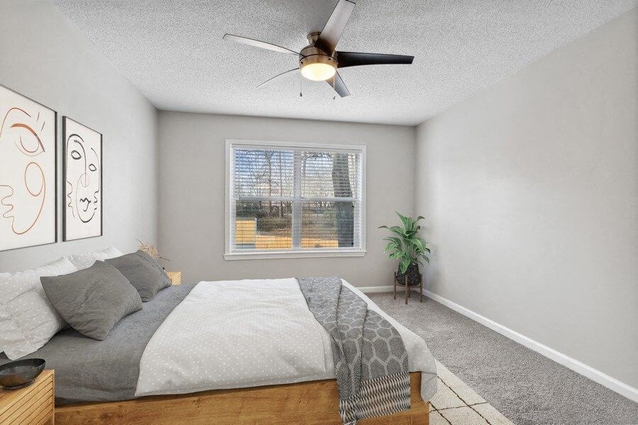 Model Bedroom with Carpet & Window View at Element 41 Apartments in Marietta, GA.