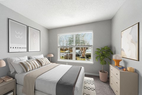 1 Bedroom Apartments in Shrewsbury, MA - Commons at Haynes Farm - Bright Bedroom With Large Window, Soft Carpet, Neutral Bedding, And Modern Dresser With Table Lamp