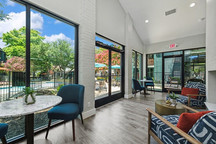 Community Clubhouse with Lounge Furniture at Bridges at Deer Run Apartments in Dallas, TX.