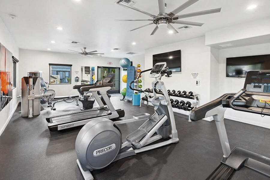 Community Fitness Center with Equipment at Ridgeline Apartments in Tucson, AZ.