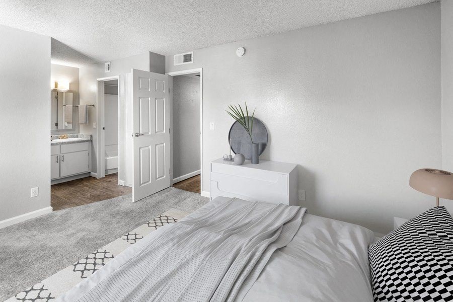 Model bedroom with queen bed