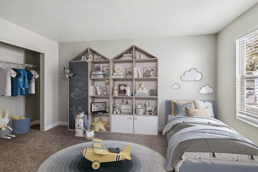 Model bedroom with a bed and a bookcase