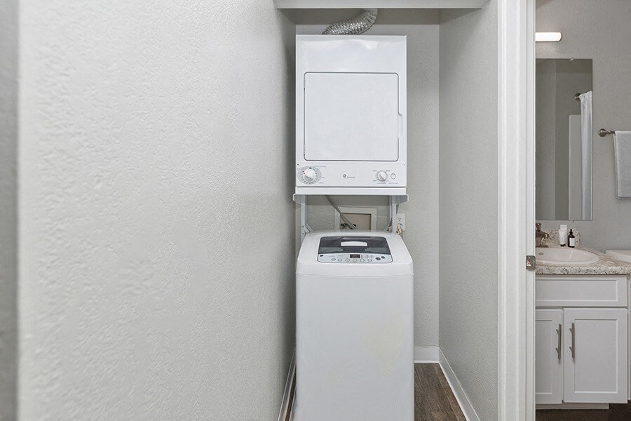 Model Unit Stackable Washer and Dryer Hook Up at The Meritage Apartments in Vallejo, CA.