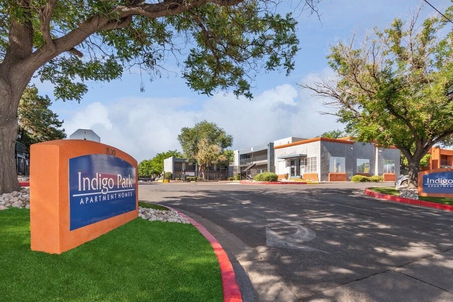 Monument Sign and Front Entrance at Indigo Park Apartments in Albuquerque, NM.