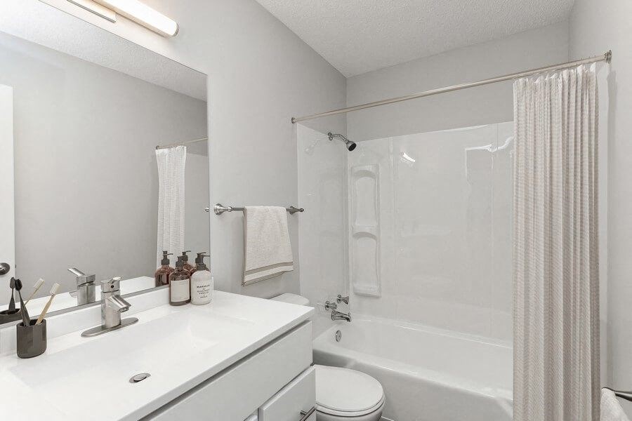 Model bathroom with white vanity