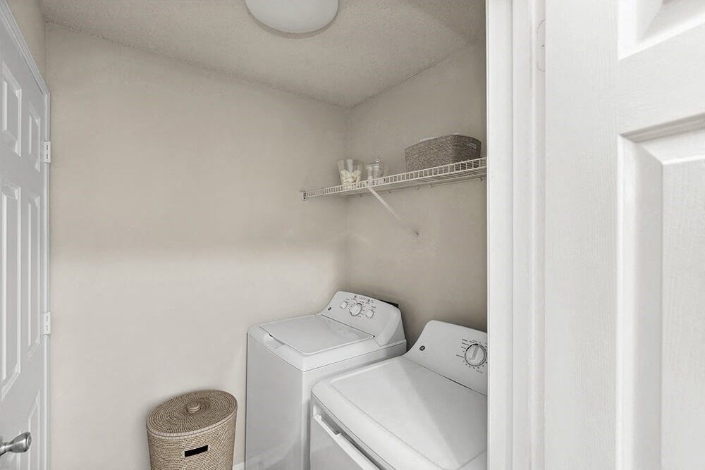 Model Laundry Room with Washer & Dryer hook up at Shadow Ridge Apartments in Riverdale, GA.