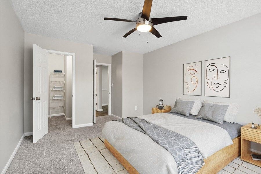 Model Bedroom with Carpet & Walk In Closet at Element 41 Apartments in Marietta, GA.