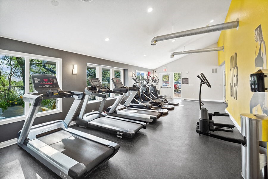Community Fitness Center with Equipment at Waterfront Apartments in Lakewood, CO.